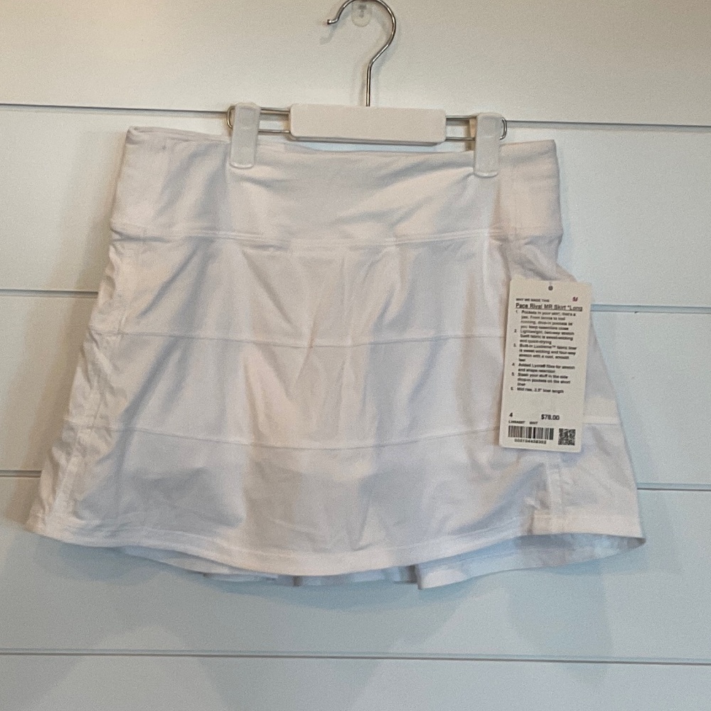 #34 NWT PACE RIVAL MR SKIRT WITH SHORTS. COLOR: WHITE SIZE: 4. #34